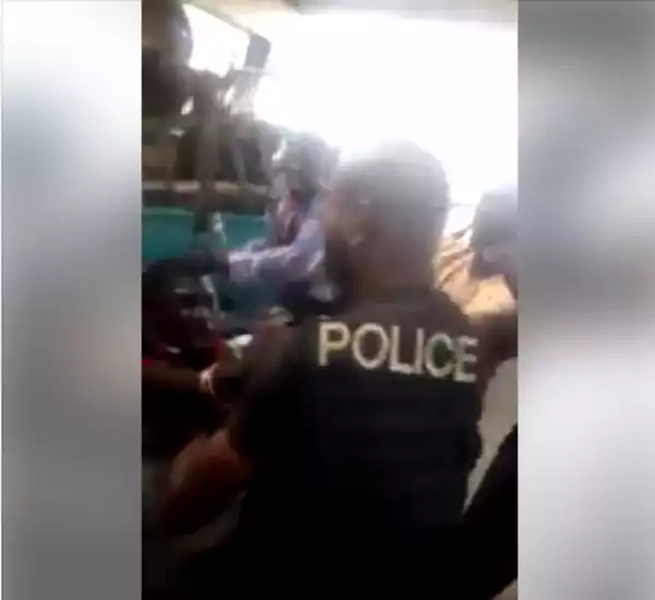 Man Fights Policeman In Public As His Colleagues Beg For His Release (Video/Photos)